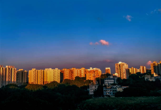 istock Sunset over the buildings in city, india 1363048143