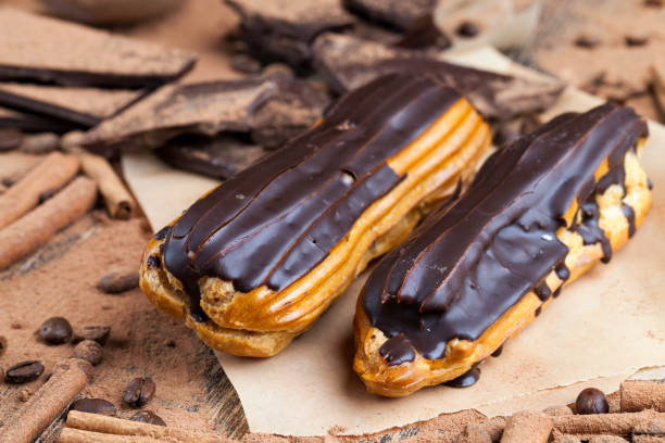 istock chocolate-covered custard eclair with creamy chocolate cream 1363052186