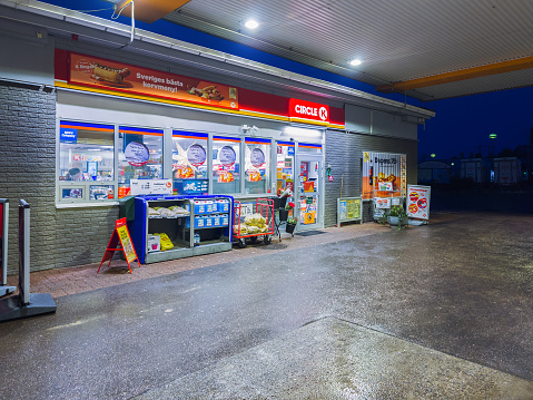 Arby, Sweden - December 15, 2021: Horizontal Night View of Circle K Gas Station Convenience Store.