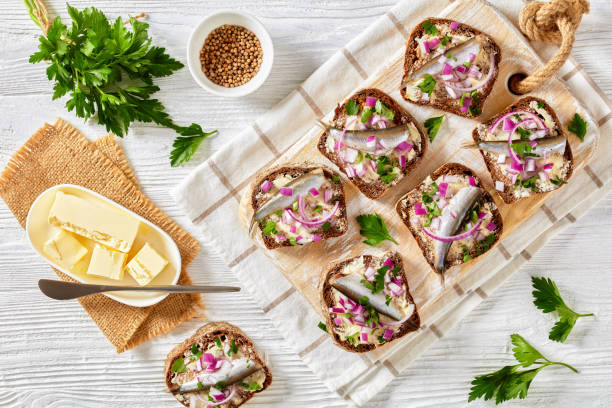 istock pickled sprat rye bread open sandwiches, top view 1363055548