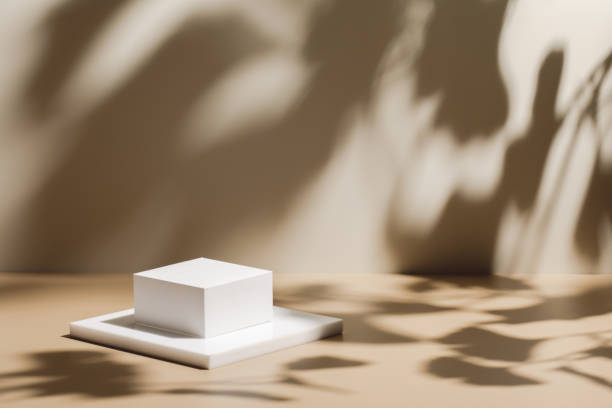 istock scene with white podium on beige background and shadows 1363056641