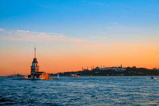 Beautiful sunset over the Maiden’s Tower, Istanbul, Turkey. Eastern travel history city concept