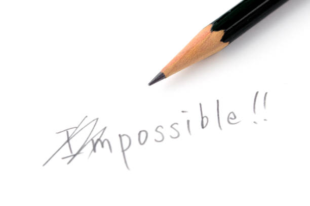 Possible word revised from impossible word Possible word revised from impossible word revised stock pictures, royalty-free photos & images