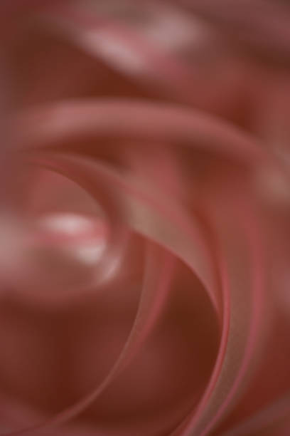istock abstract, defocused, pink curling ribbon blurred textured bokeh background 1363069672