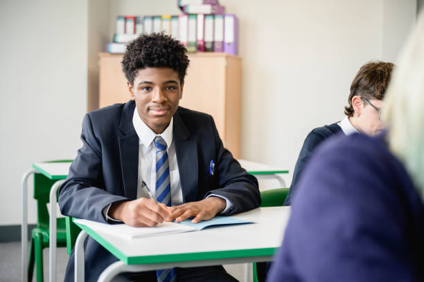 istock Portrait of confident Black secondary student taking exam 1363069798