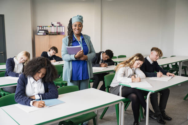 istock Classroom portrait of Black educator and secondary students 1363069814