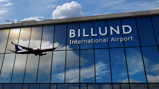 Airplane landing at Billund Denmark airport mirrored in terminal Aircraft landing at Billund, Denmark 3D rendering illustration. Arrival in the city with the glass airport terminal and reflection of jet plane. Travel, business, tourism and transport. billund stock pictures, royalty-free photos & images