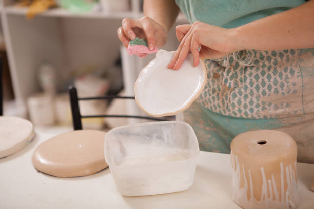 istock Professional female potter at her workshop 1363072965