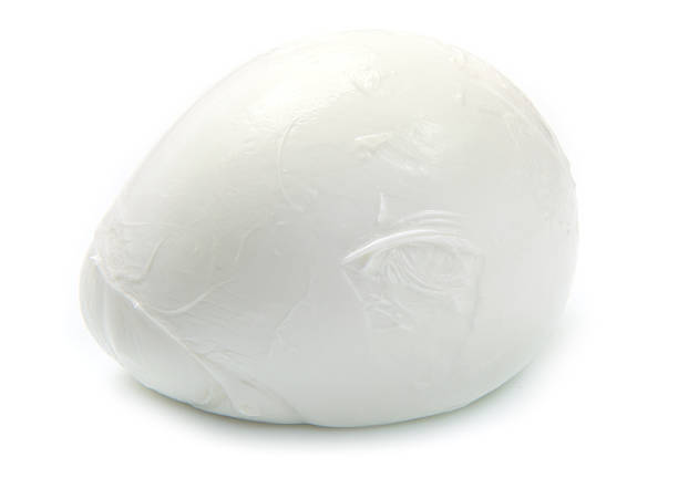 istock A ball of Italian mozzarella cheese on a white background 136307555