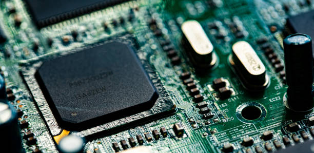 istock Macro Close up of components and microchips on PC circuit board 1363075809