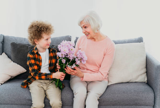 istock Grandparents and grandson playing at home 1363084565