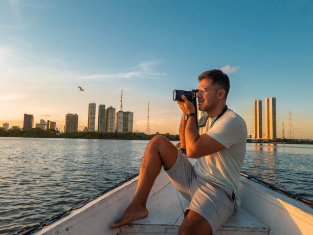 istock Tourist taking picture on boat trip 1363086123