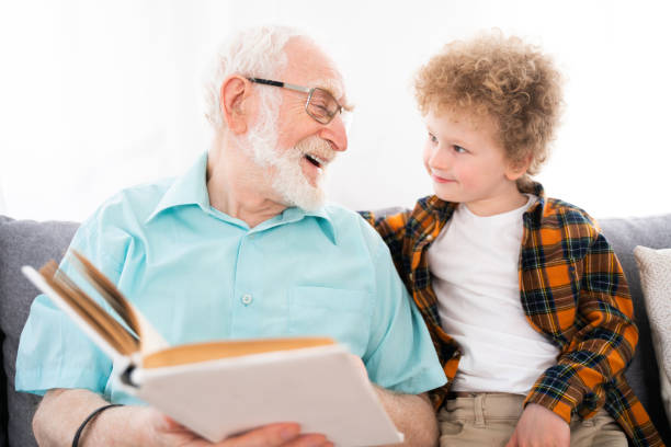 istock Grandparents and grandson playing at home 1363087919
