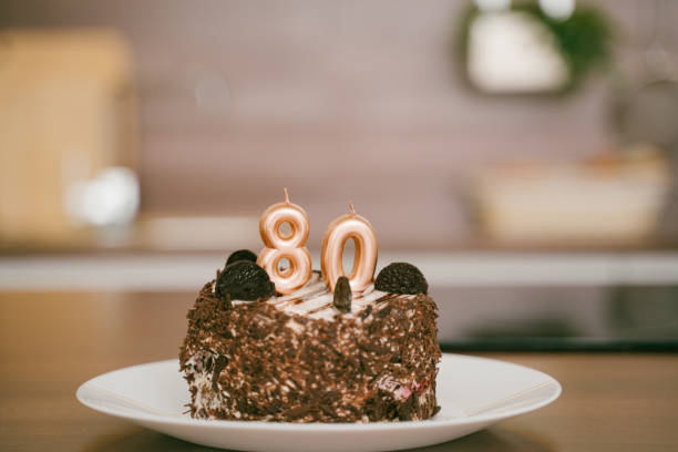 Birthday cake with candles, celebration for 80 years anniversary