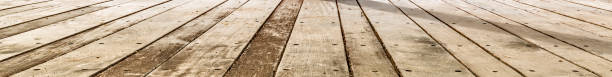 istock Wooden board or plank as a copy space for holiday greetings 1363090370