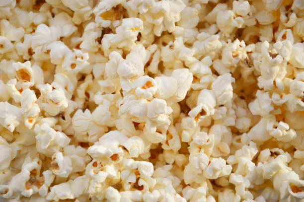 istock popcorn on a plate. background for popcorn and movie day decoration. 1363090968
