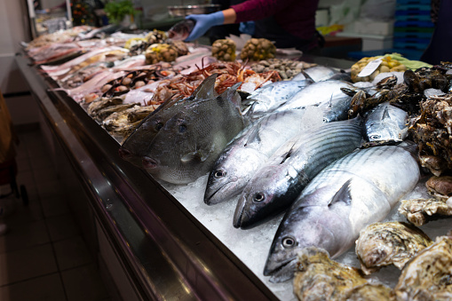 Seattle, WA, USA - JULY 21:  Fish Market at Pike Place Market in downtown Seattle on July 24, 2018 in Seattle, Washington.