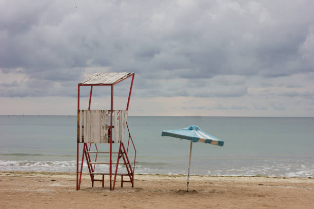 istock End of Summer Empty Beach Stormy Sky 1363092190