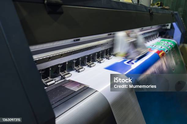 Large Format Inkjet Printer Working On Vinyl Paper In Workplace Stock Photo - Download Image Now