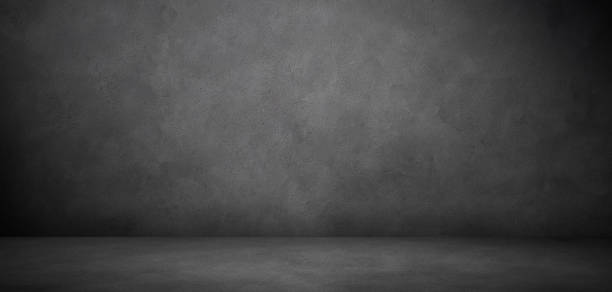 istock Concrete wall and floor background for product display or mock up, tree dimensional show room in the dark 1363097378