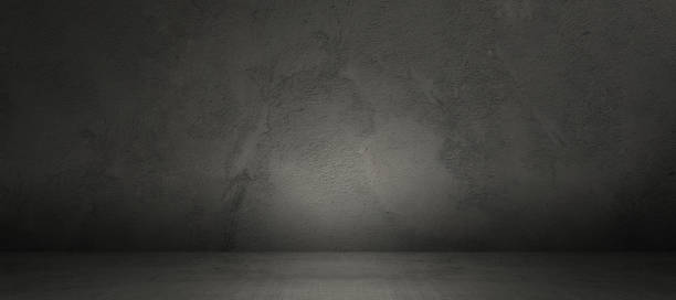 istock Concrete wall and floor background for product display or mock up, tree dimensional room in the dark with central lighting 1363097382