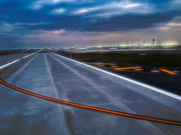Taxiway at large airport, with digital glow effect stock photo
