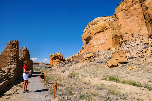 istock Chaco Culture NHP - Studying Trail Guide at Hungo Pavi Site 1363097873