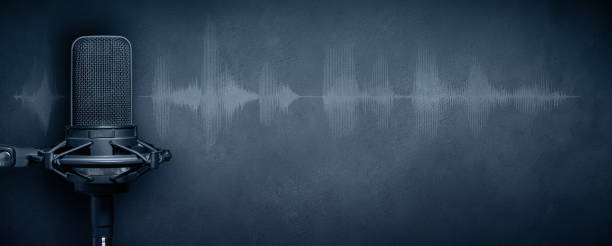 Studio microphone with audio waveform on concrete wall background. Podcast or broadcast banner with copy space.