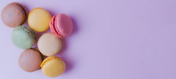 istock Macarons dessert on pastel tones background. Copy space. 1363098653