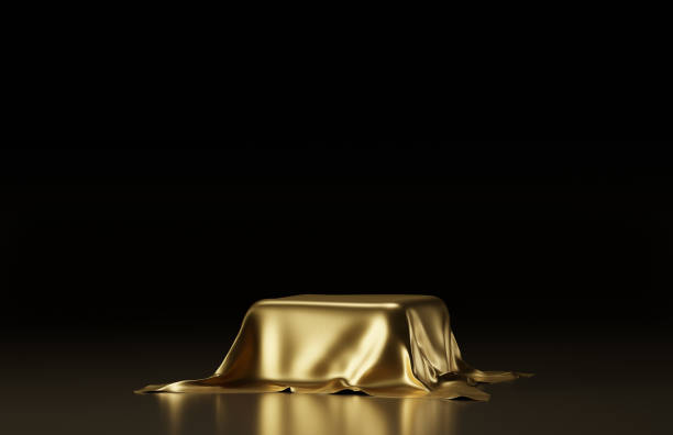 istock An empty pedestal covered with a golden cloth. 3D rendering illustration. 1363098688