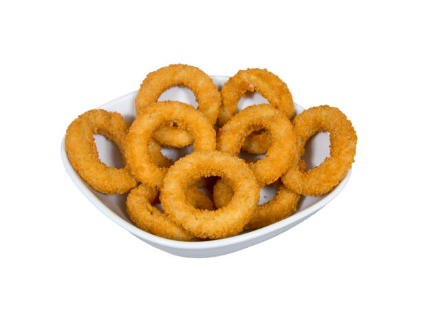 fried onion rings in plate on white background onion rings, white background fried onion rings stock pictures, royalty-free photos & images