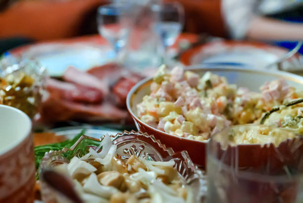 Traditional Russian New Year's table. Salads and cold cuts.