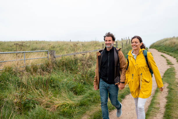 istock Couple Walking to the Beach 1363100307