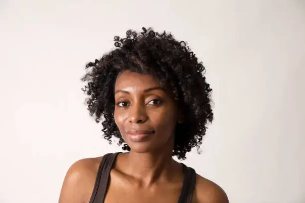 Beautiful black woman portrait smiling to the camera