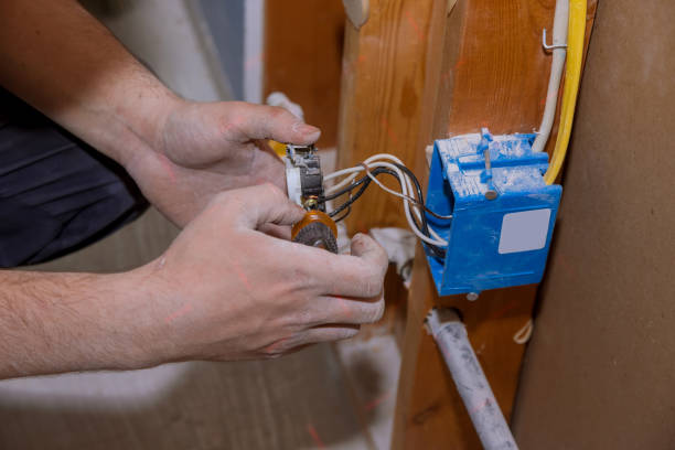 istock Preparing to remove an electrical outlet of the screws for electrical wires 1363106784