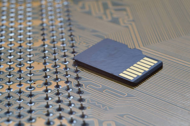istock the black micro sd card lies on the microcircuit. close-up. 1363108058