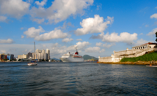 Santos, São Paulo - Brazil - February 19, 2011:  Pullmantour Horizon cruise ship crowded with passengers departing from the port of Santos.