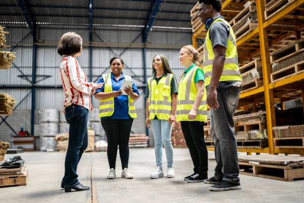 istock Team meeting in a warehouse 1363110853