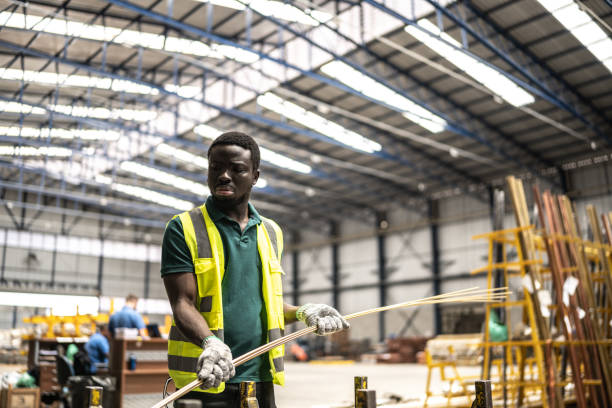 istock Employee working in a factory 1363110887
