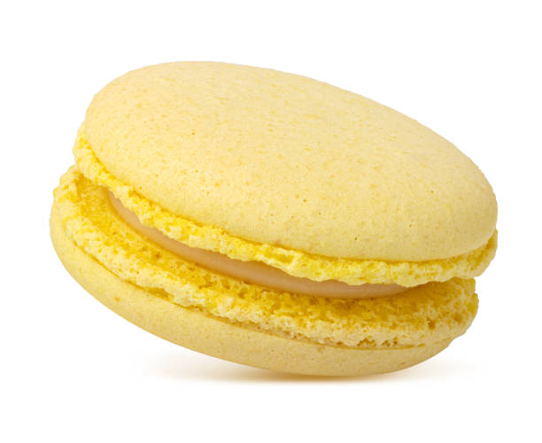 istock Yellow macaroon isolated on white background 1363112133