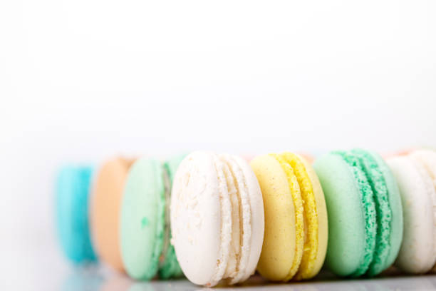 Background of colored sweet macaroons with bokeh