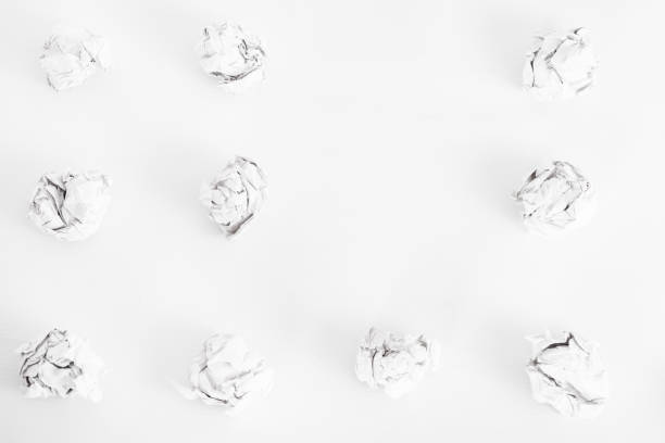istock overhead shot of crumpled paper in oder and copy space in the middle on white background. great idea concept 1363113639