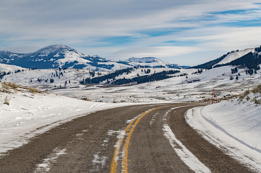 Yellowstone Lamar Valley winter landscape at in Yellowstone National Park in northwestern United States of America (USA). Nearby towns are Gardiner, Cooke City, Bozeman and Billings, Montana and Jackson Hole Wyoming.