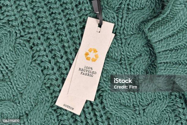 Cotton Fabric With Label Saying 100 Recycled Fabric Stock Photo - Download Image Now