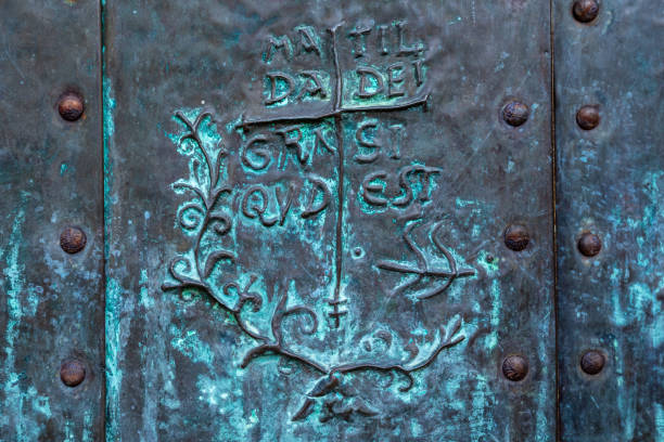 the signature of Matilde di Canossa impressed on the door of a church in Marola (Reggio Emilia Italy)
