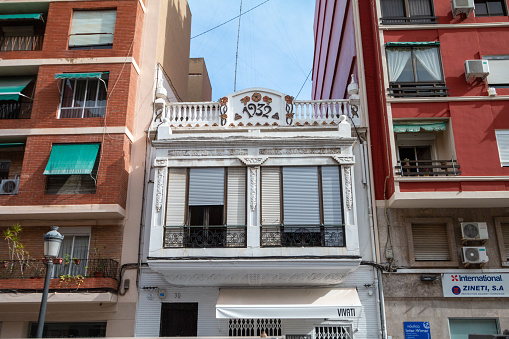 Privately owned Building Exterior (1932) on Calle de la Reina at Poblats Marítims in Valencia, Spain