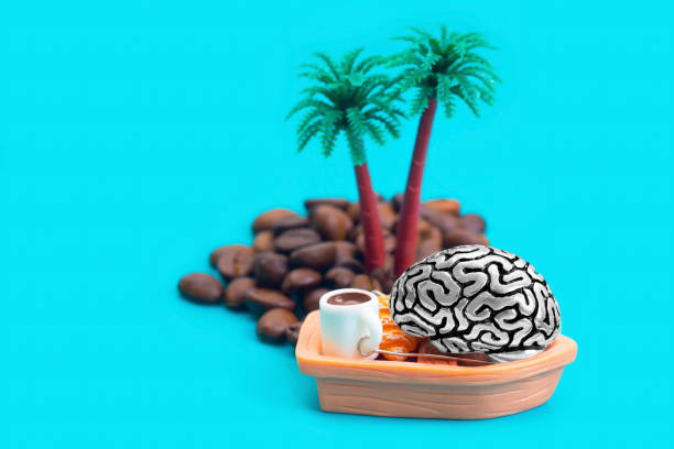 istock Brain figurine enjoying coffee with croissant 1363121151