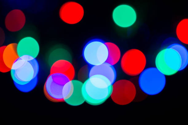 istock Defocused colorful light sources. Christmas bokeh. Blurred and blended lights 1363123699