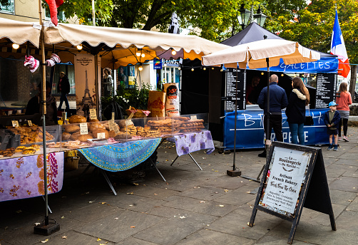 Stalls at a French market selling bread, cakes and galettes in Horsham, West Sussex, UK. Since Brexit French traders have faced more red tape if they wish to attend French markets held in many English towns.