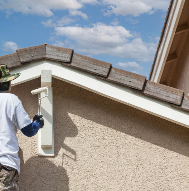 istock Abstract of Professional Painter Using A Roller to Paint House Details. 1363124548